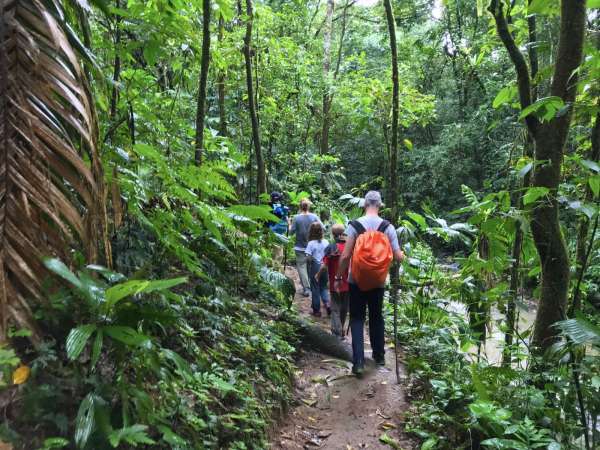 Family at Hiking Trail in Hacienda Ébano, a Nature Reserve and Farm with Rainforest and Waterfalls at Barú Costa Rica