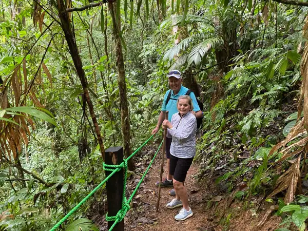 A couple of seniors hiking in the nature reserve trails of Hacienda Ebano